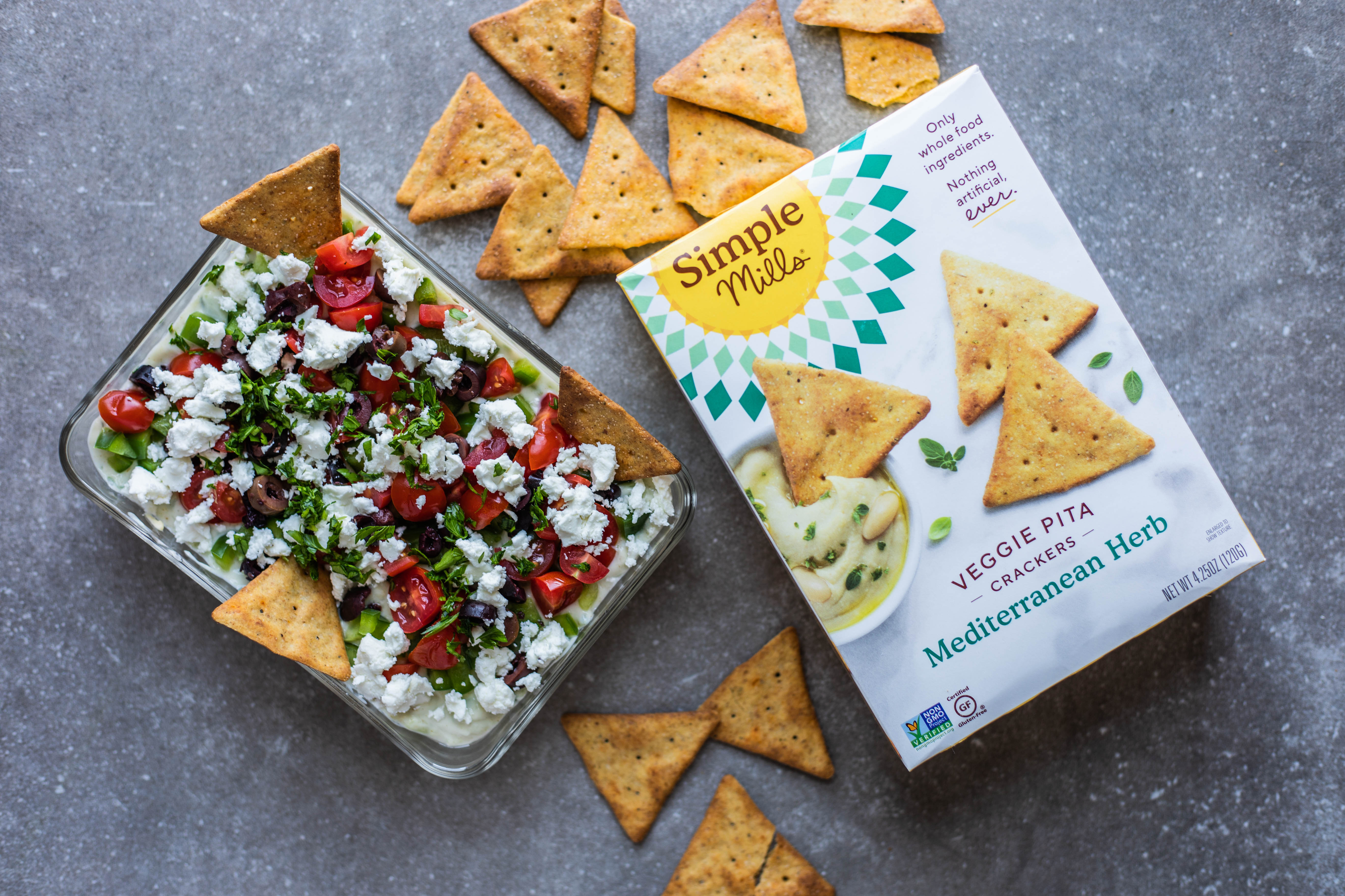 Layered Mediterranean Dip with Veggie Pita Crackers