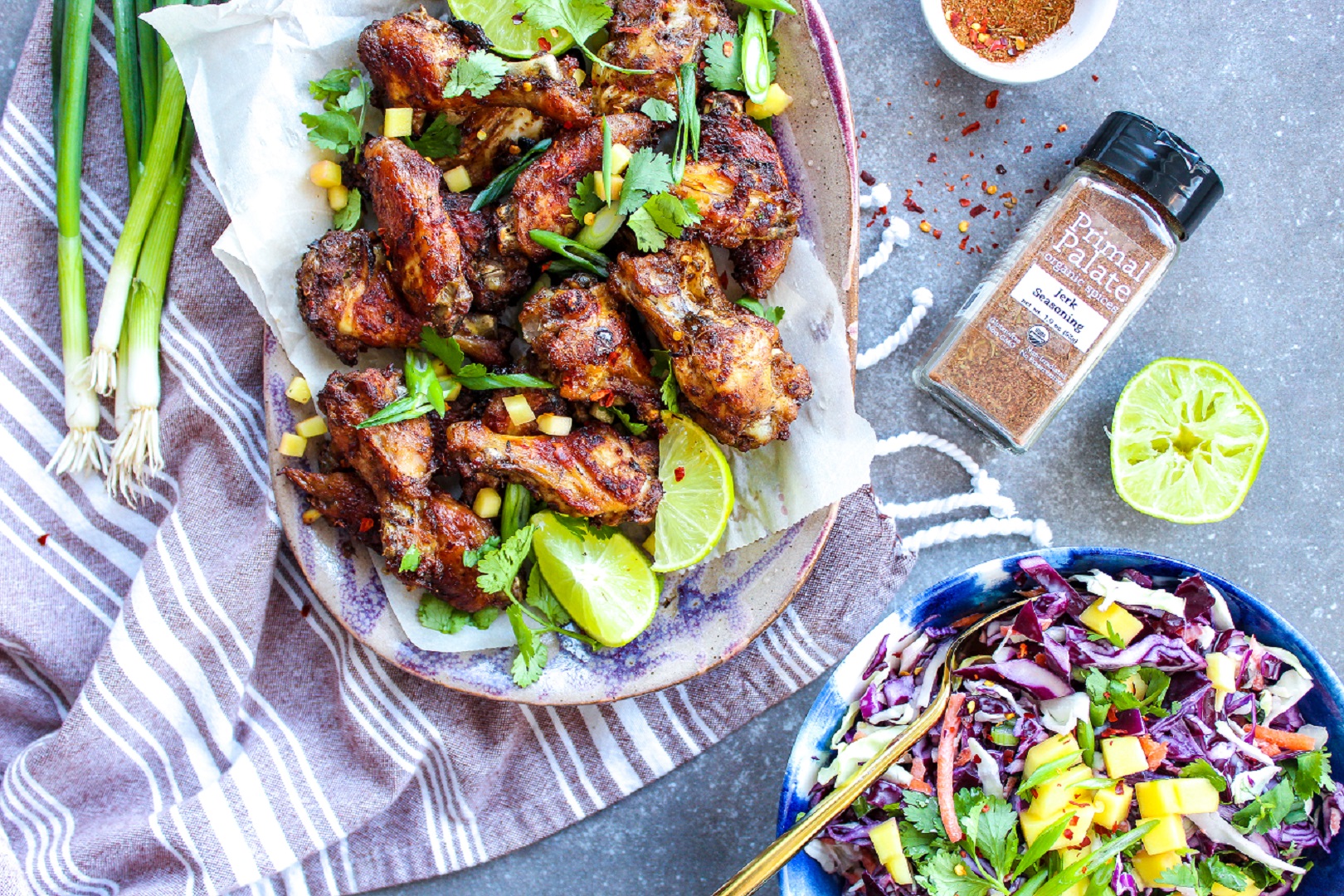 Jerk Seasoned Chicken Wings with Mango Slaw