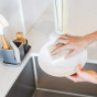 Action shot of Full Circle Beachy Clean Heavy Duty Coconut Scour Pads, 3pk